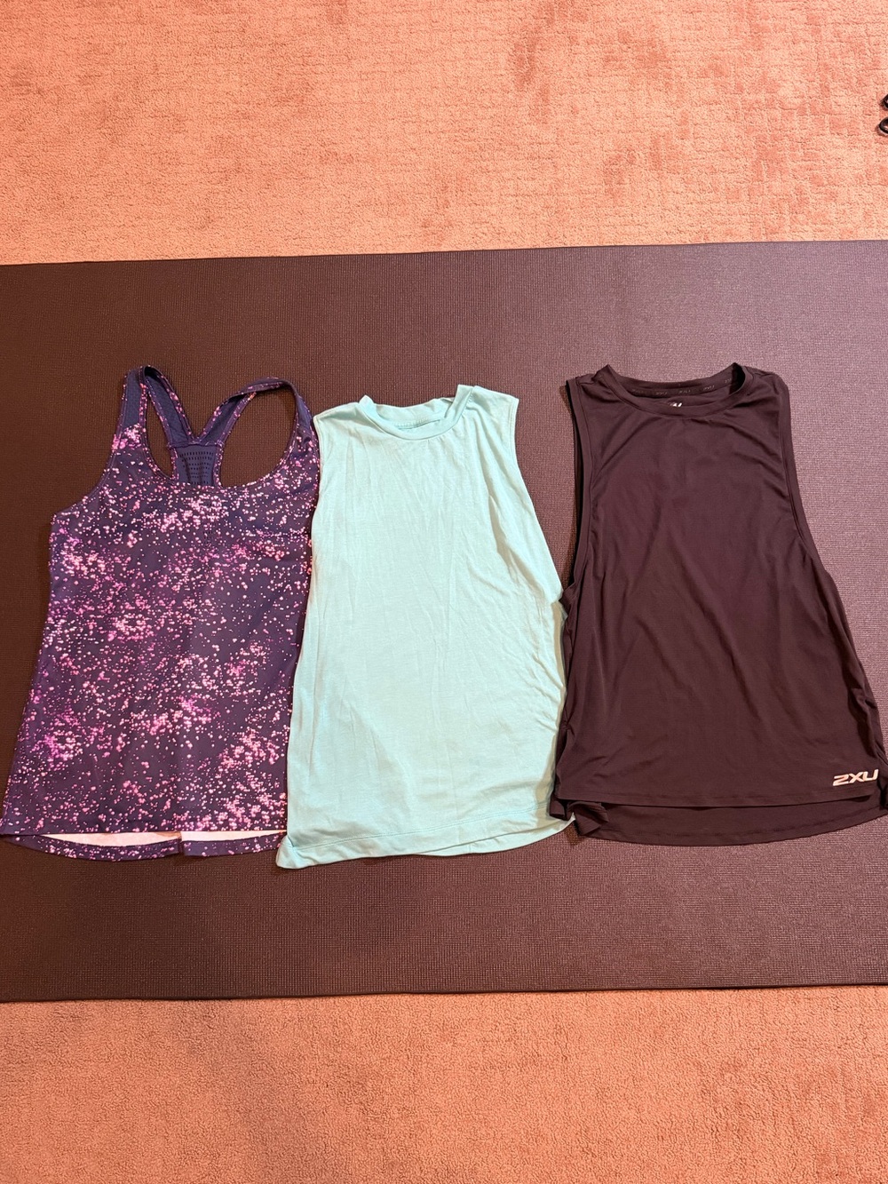 2XU, Cotopaxi and purple tank tops